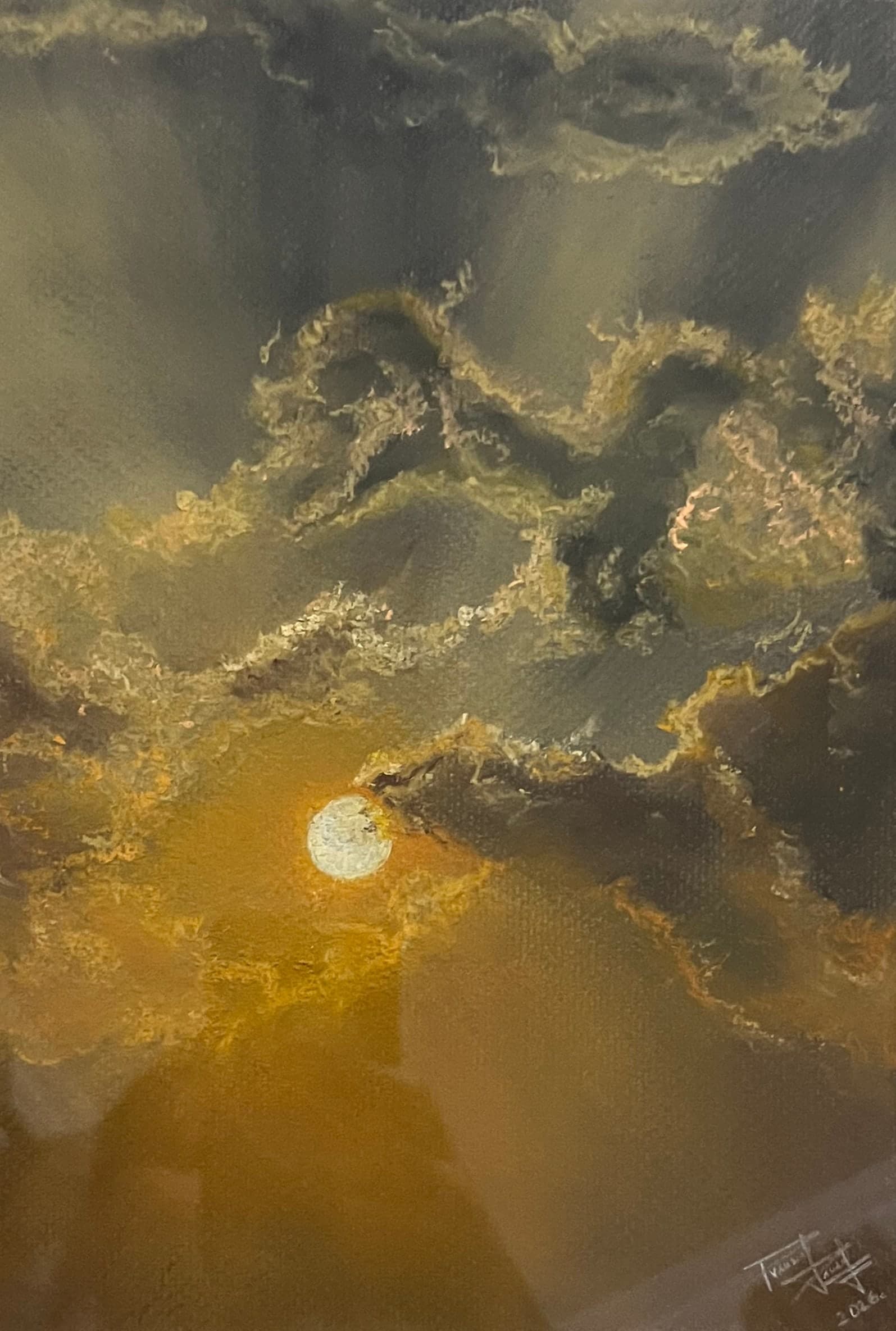 A pale sun glows through churning grey and gold clouds, with rays falling diagonally through the haze.