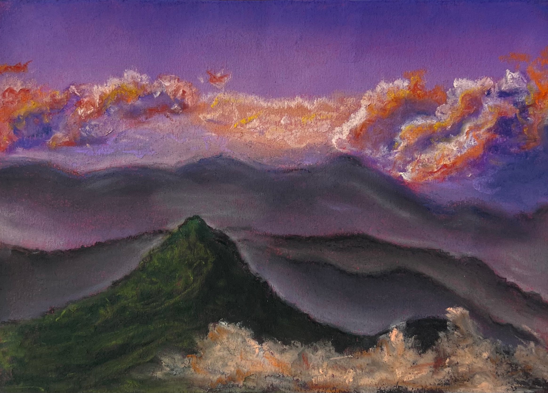 Layers of misty grey ridges recede under a violet sky edged with orange cloud; a green peak rises in the foreground.